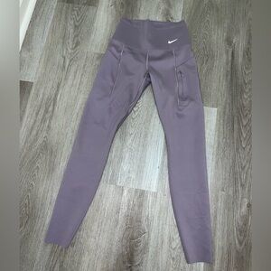 Nike Women's Go Dri-Fit High Rise 7/8 Leggings with drawstring and pockets